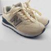 Baskets basses New Balance WL574 pour femme, taille 36,5, couleur beige, vue de profil, en excellent état